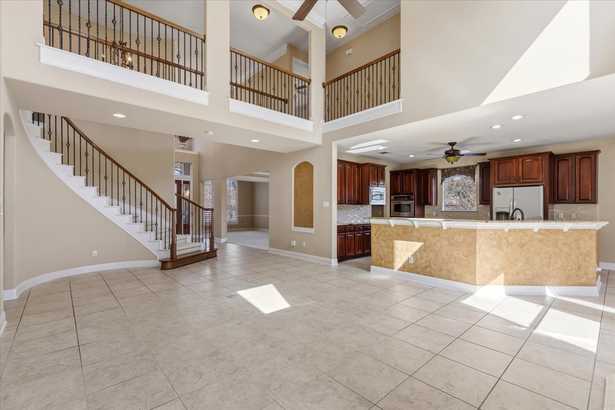 111 Whitley Drive Austin, TX 78738 - Photo 9 of 38 a view of kitchen with furniture and a living room