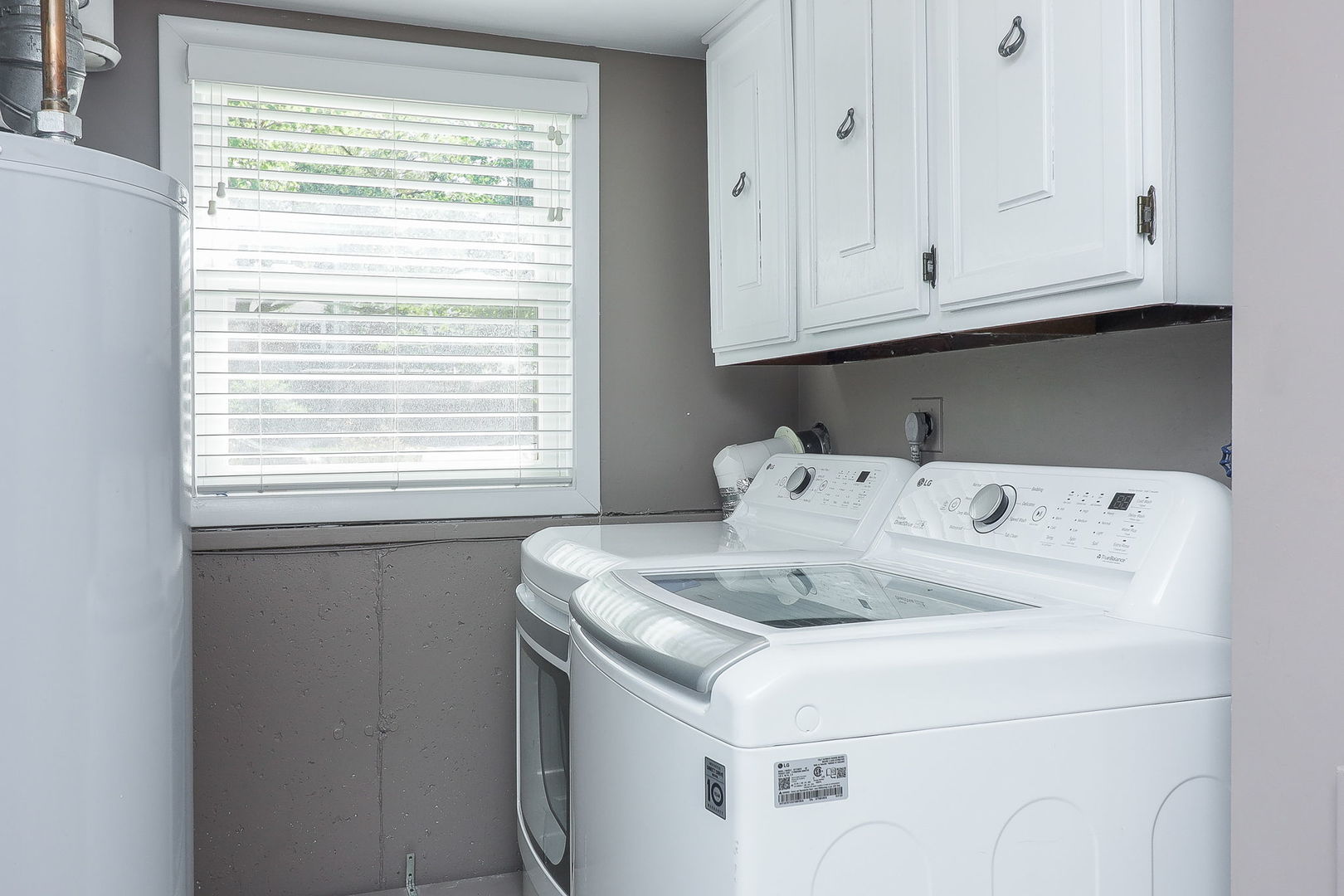 307 Cedarbrook Road Naperville, IL 60565 - Photo 12 of 25 a utility room with dryer and washer