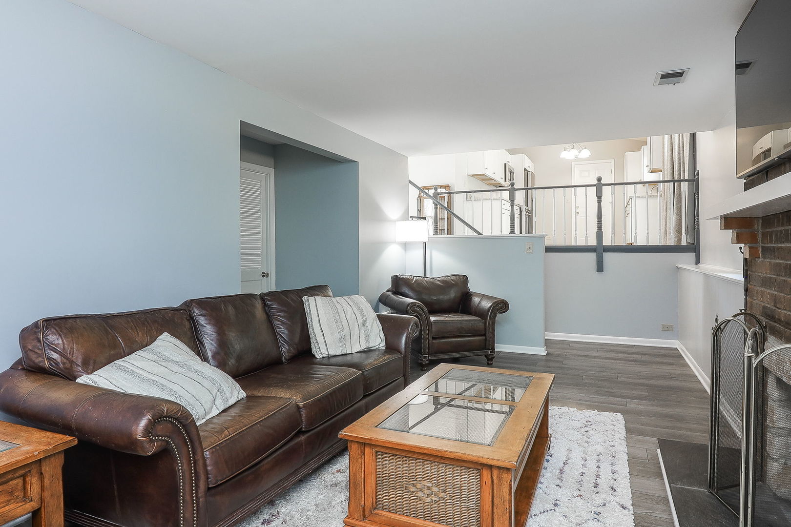 307 Cedarbrook Road Naperville, IL 60565 - Photo 10 of 25 a living room with furniture and a rug