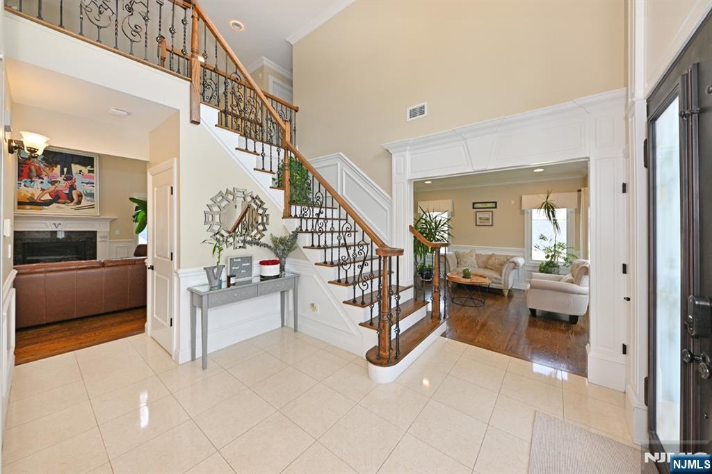 106 Arnot Place Paramus, NJ 07652 - Photo 2 of 48 a view of a livingroom with furniture and toys