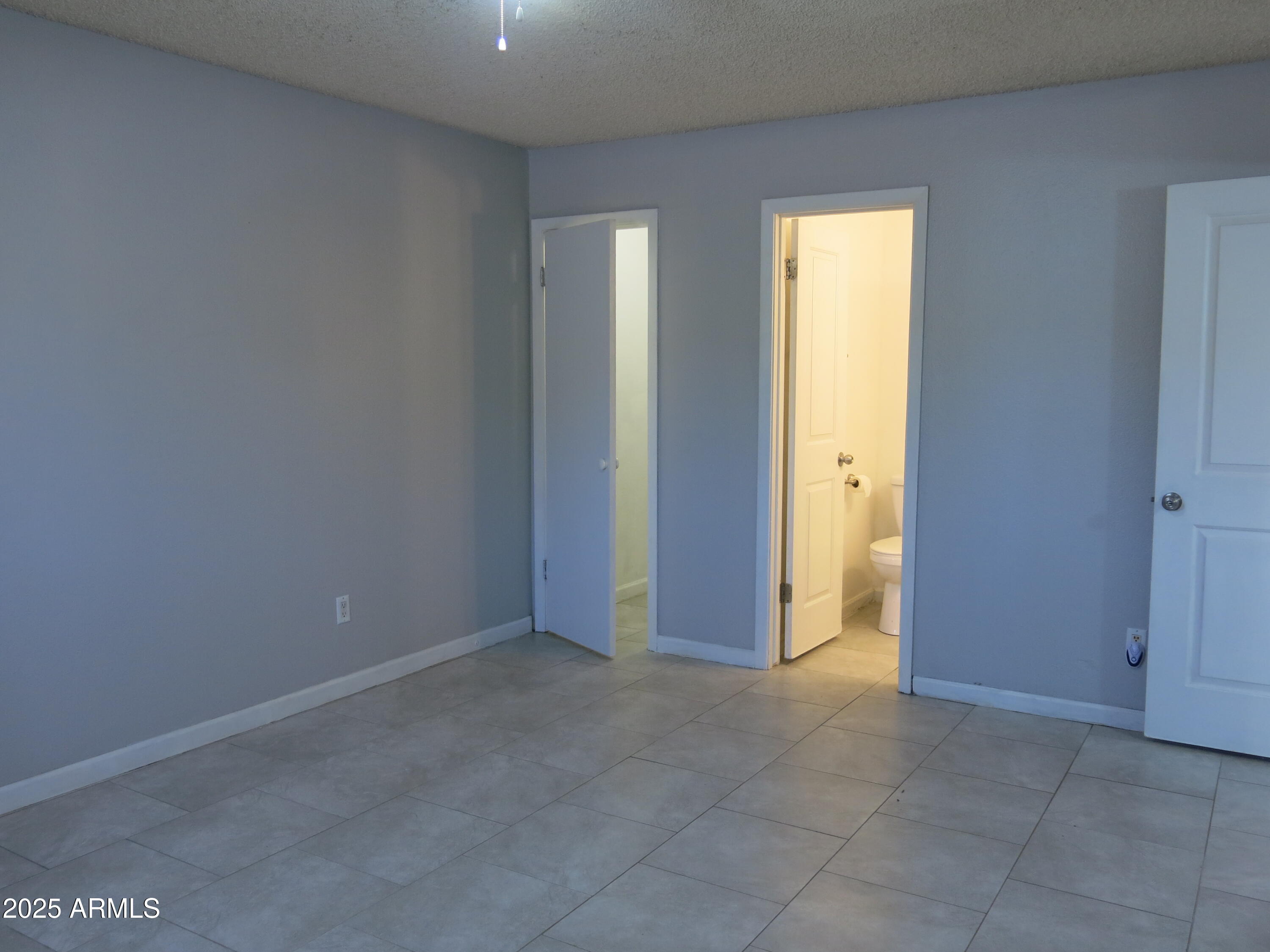1130 East Butler Drive, Unit B4 Phoenix, AZ 85020 - Photo 16 of 33 Primary Bedroom