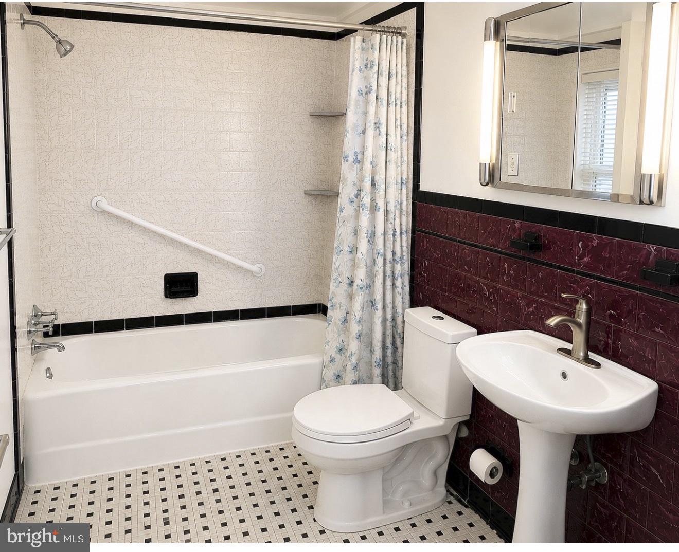 1615 Burnwood Road Baltimore, MD 21239 - Photo 14 of 83 Charming bathroom with classic tiles.