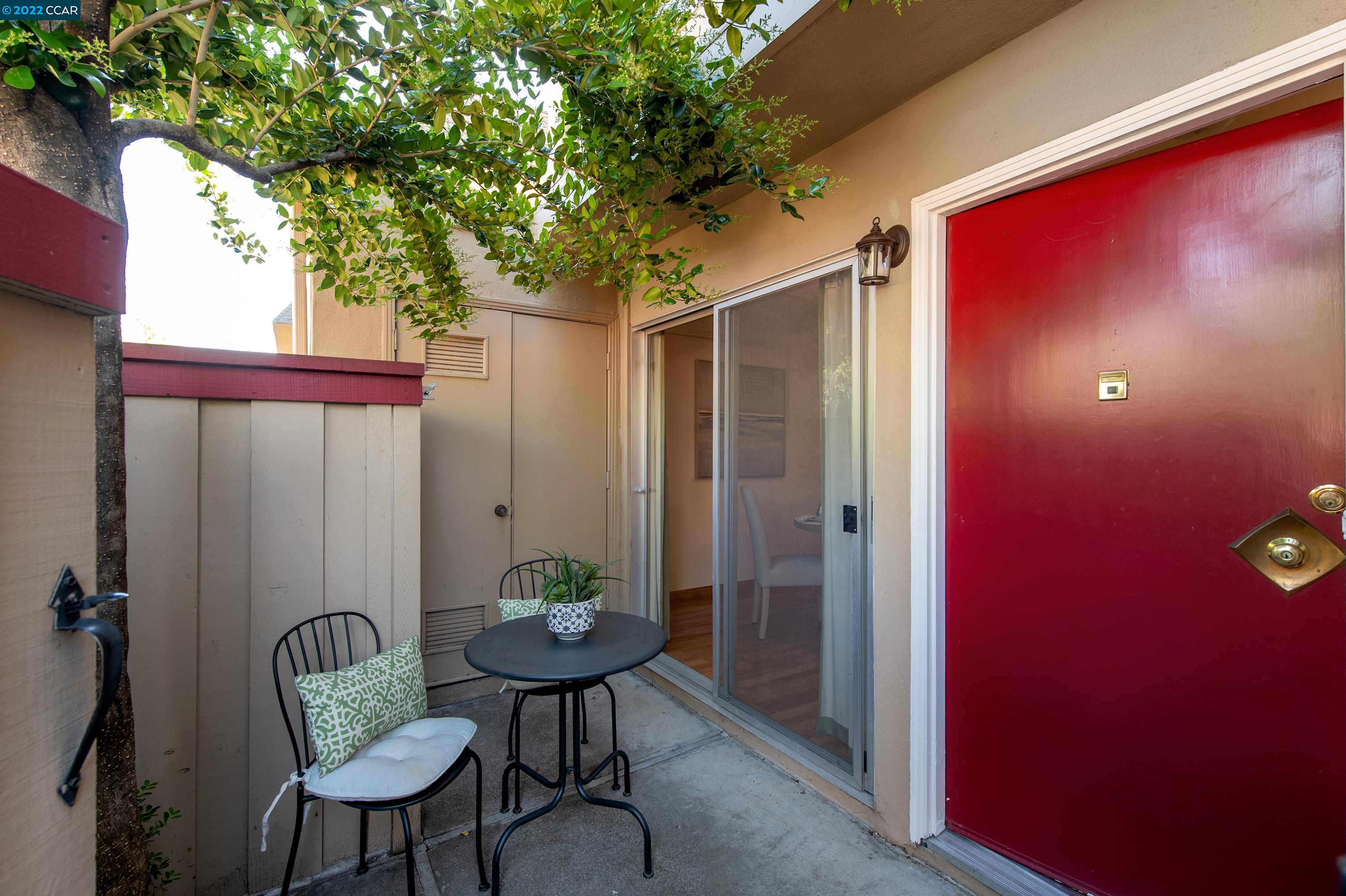 1030 Bancroft Road Concord, CA 94518 - Photo 1 of 1 a backyard of a house with table and chairs
