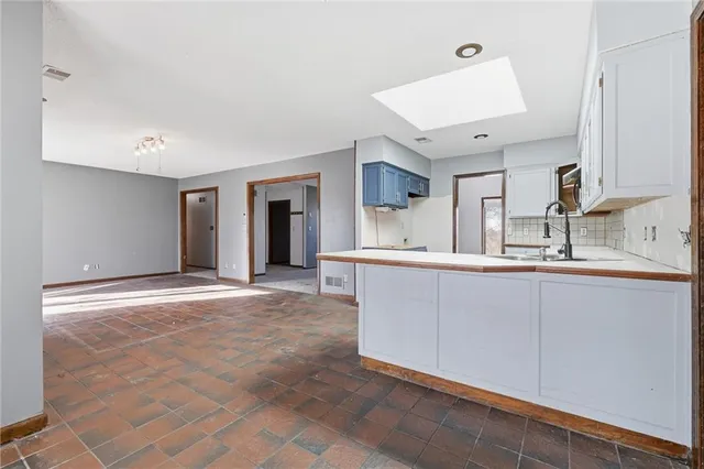 $395,000 | 5725 Malcolm Lake Road, Edgerton, MO 64444