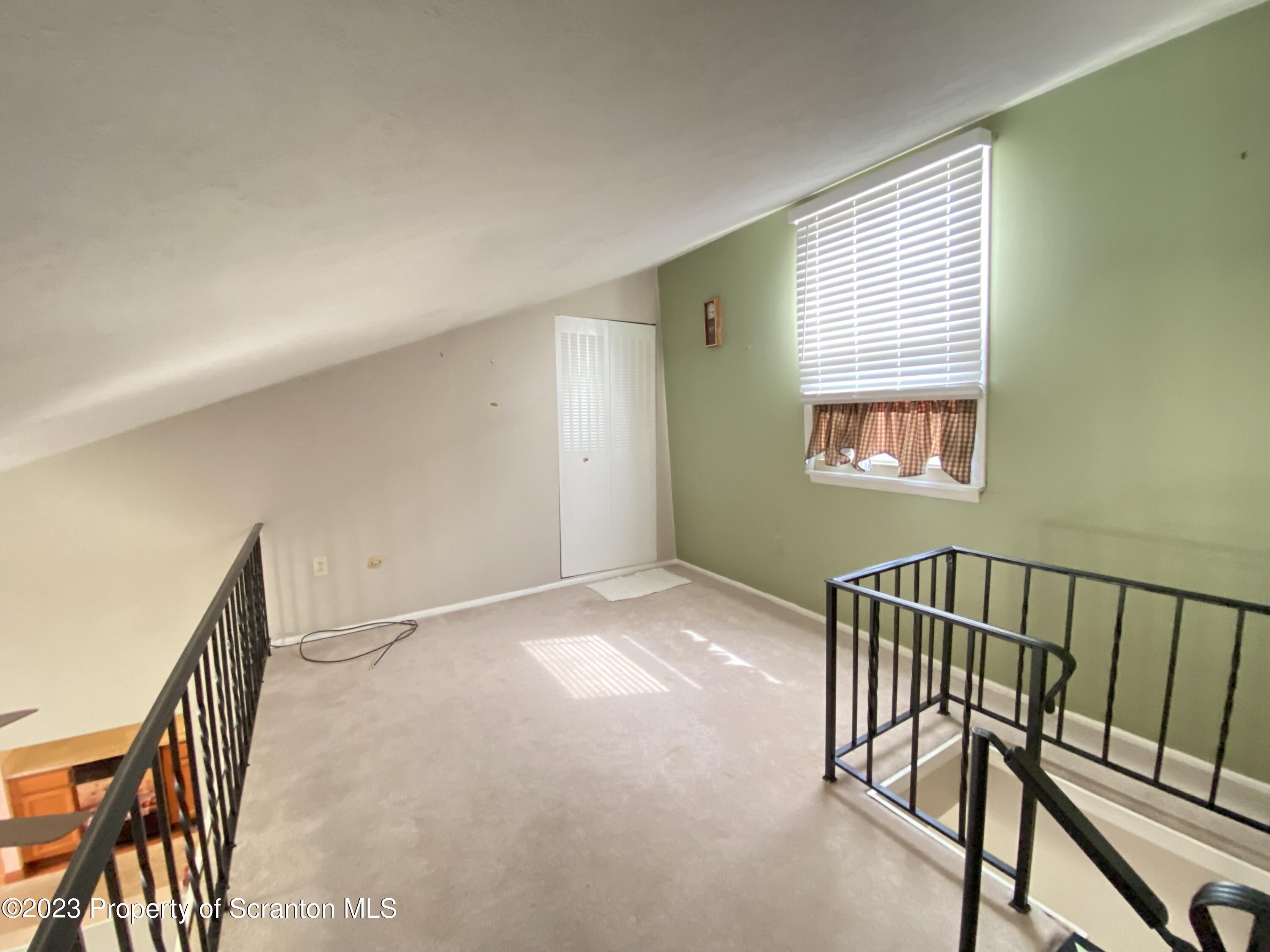 1112 Summit Pointe Scranton, PA 18508 - Photo 13 of 29 a view of a hallway with windows