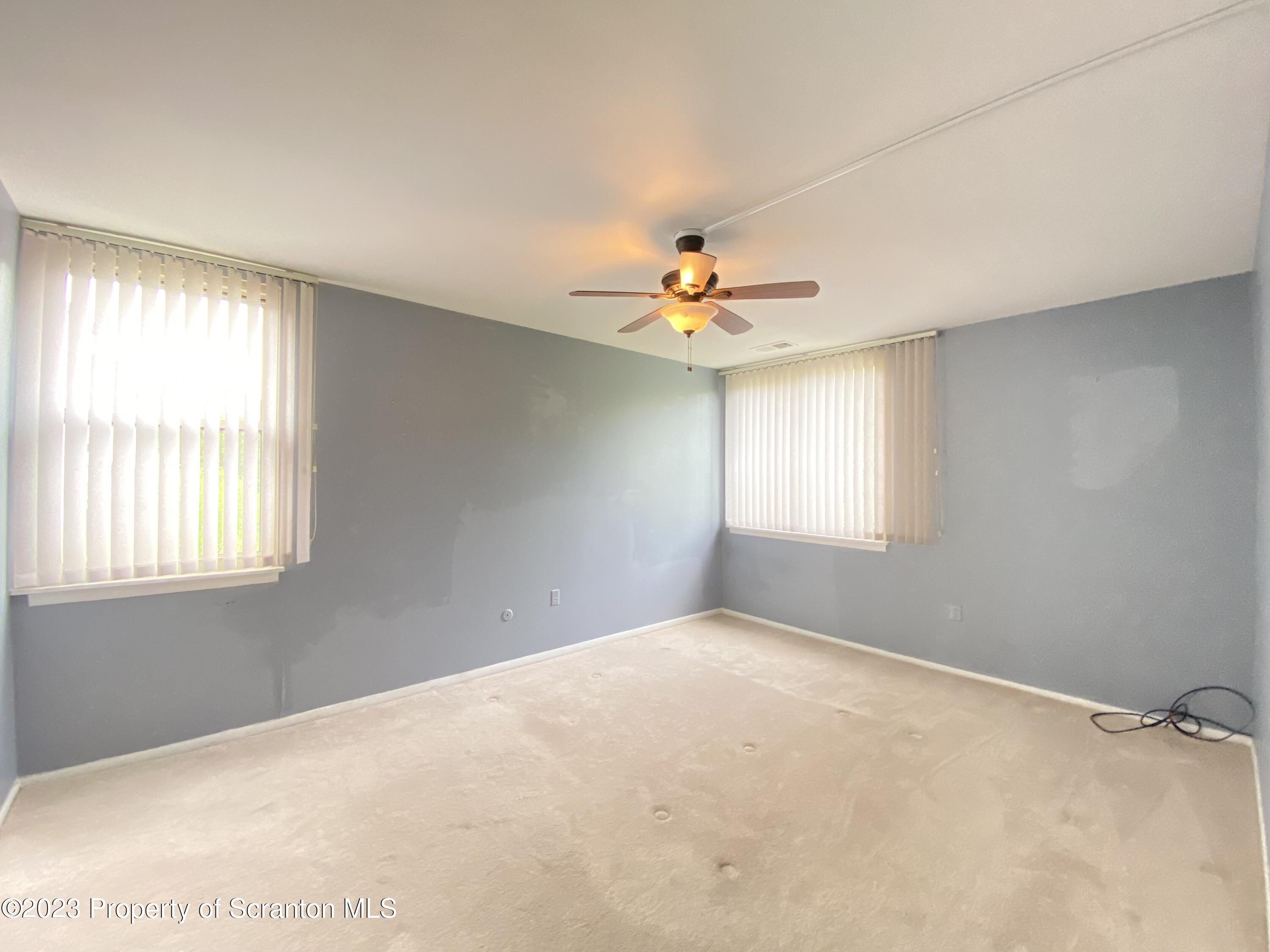1112 Summit Pointe Scranton, PA 18508 - Photo 20 of 29 a view of an empty room with a window