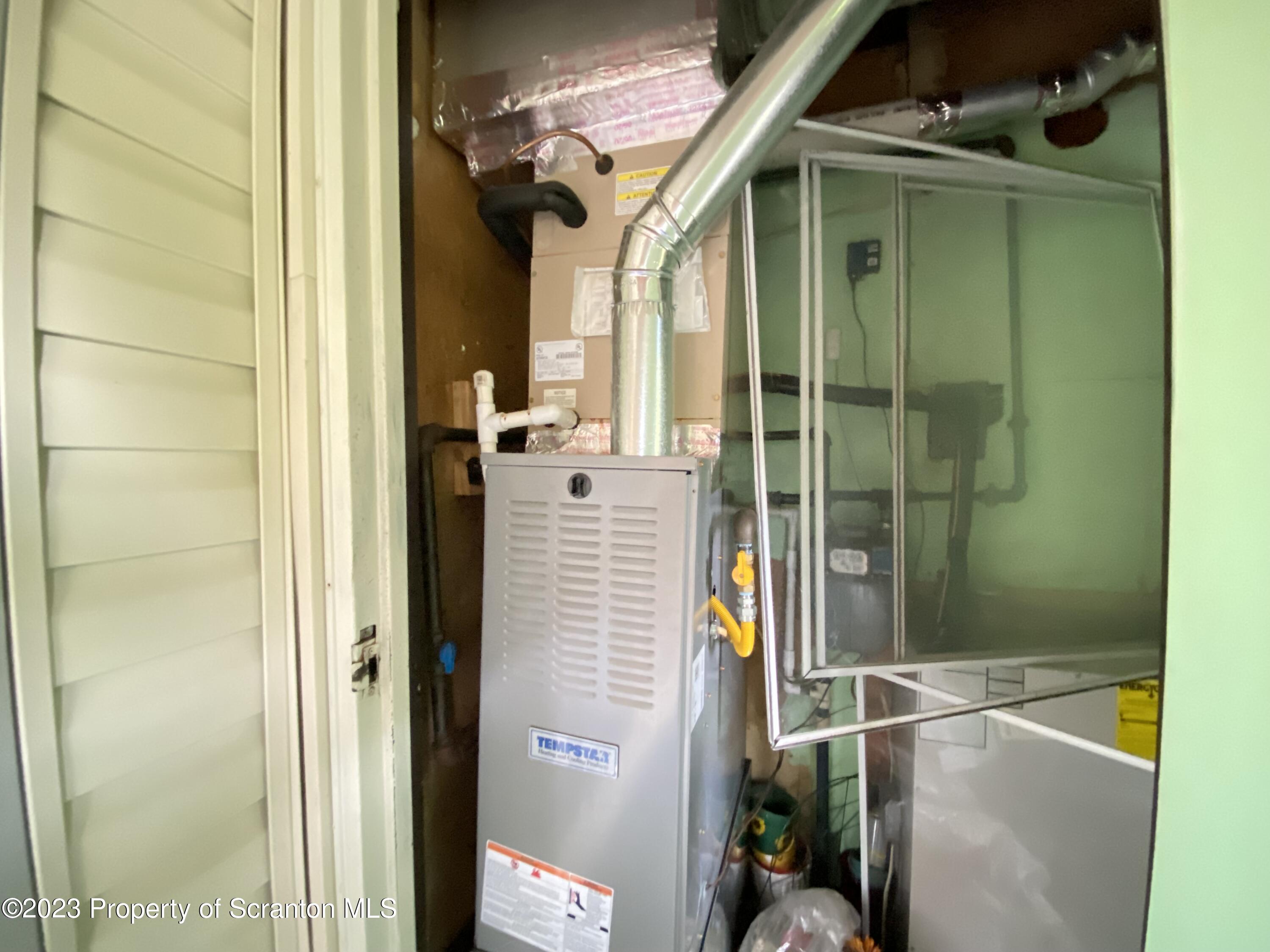1112 Summit Pointe Scranton, PA 18508 - Photo 27 of 29 a bathroom with a shower and a sink