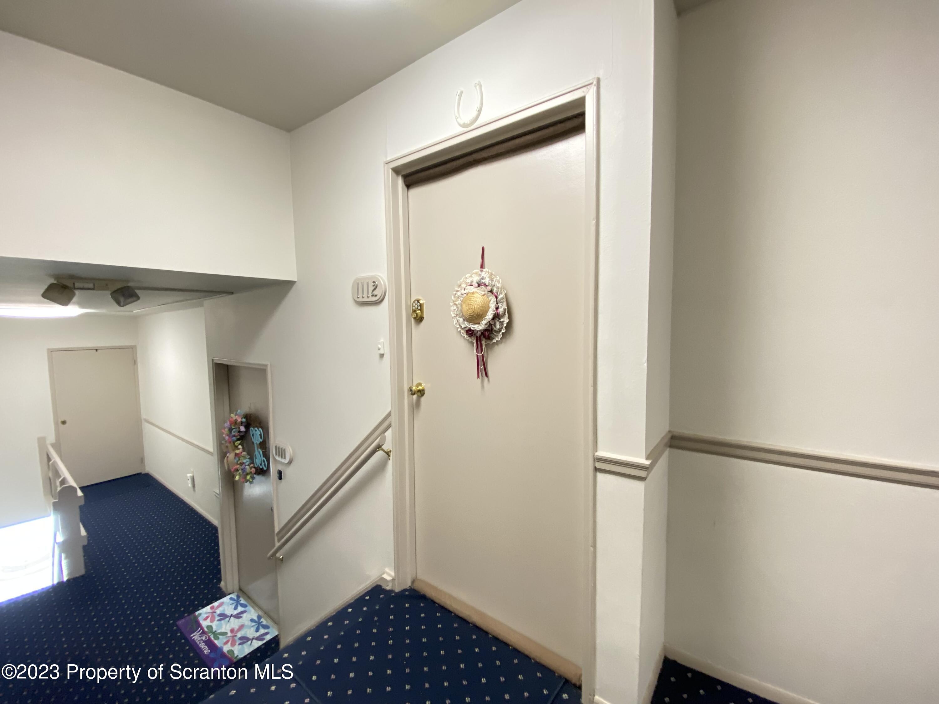1112 Summit Pointe Scranton, PA 18508 - Photo 3 of 29 a view of entryway with wooden floor