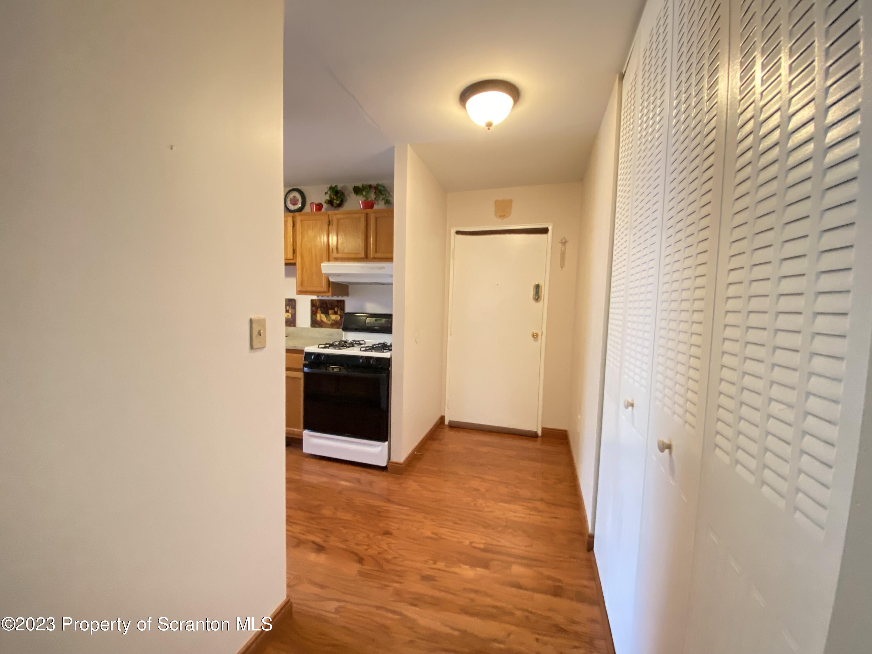 1112 Summit Pointe Scranton, PA 18508 - Photo 4 of 29 a view of a kitchen from the hallway