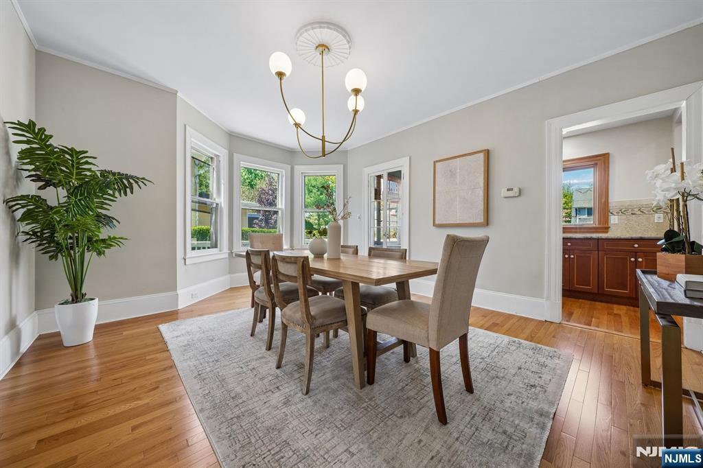 215 Inwood Avenue Montclair, NJ 07043 - Photo 16 of 50 a view of a dining room with furniture window and wooden floor