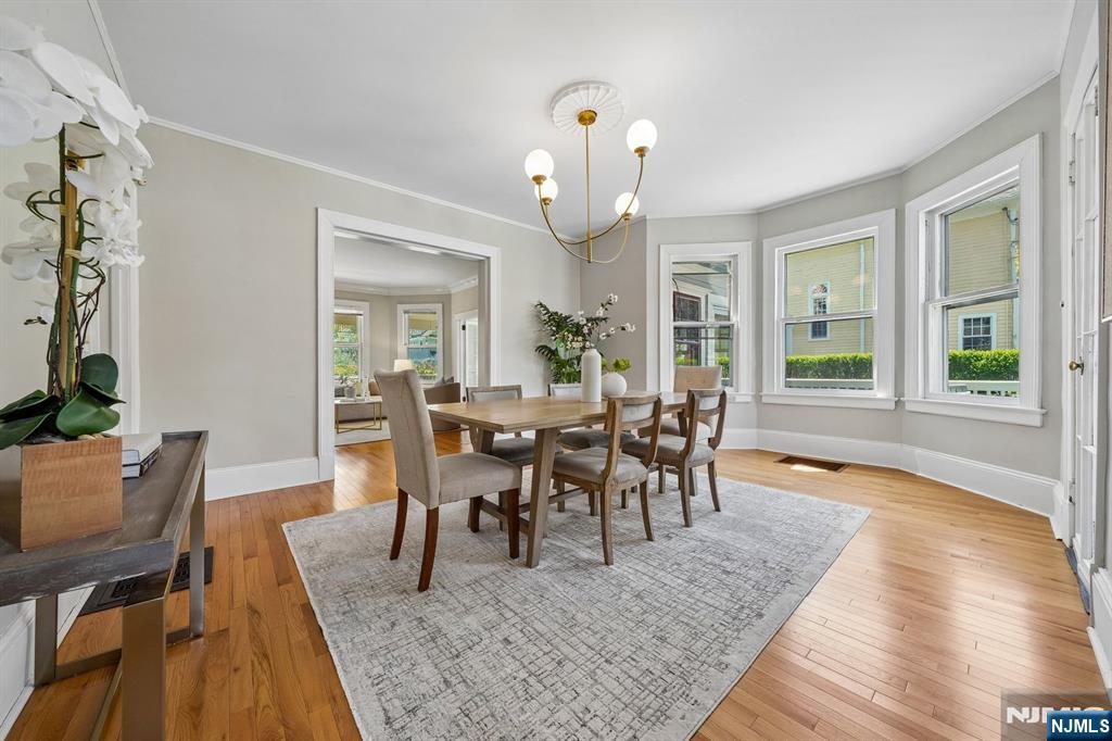 215 Inwood Avenue Montclair, NJ 07043 - Photo 17 of 50 a view of a dining room with furniture and wooden floor