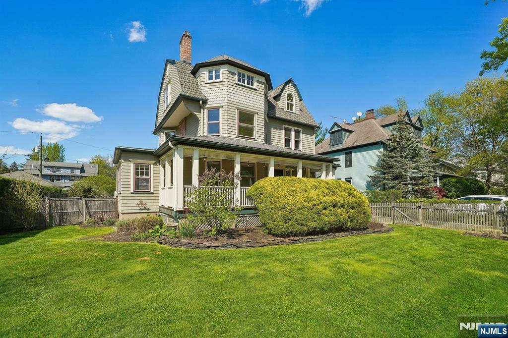 215 Inwood Avenue Montclair, NJ 07043 - Photo 2 of 50 a front view of a house with a garden