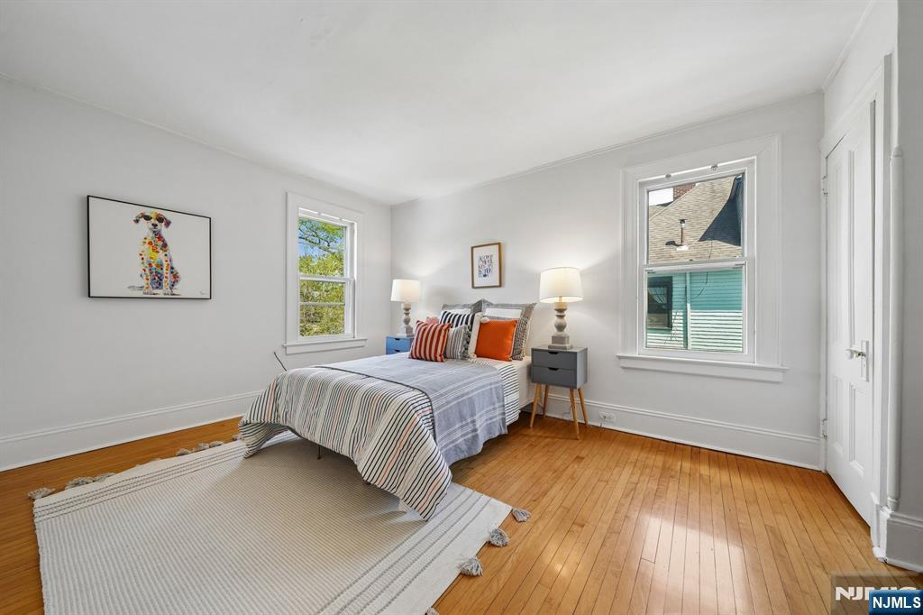 215 Inwood Avenue Montclair, NJ 07043 - Photo 34 of 50 a bed room with a bed and a window