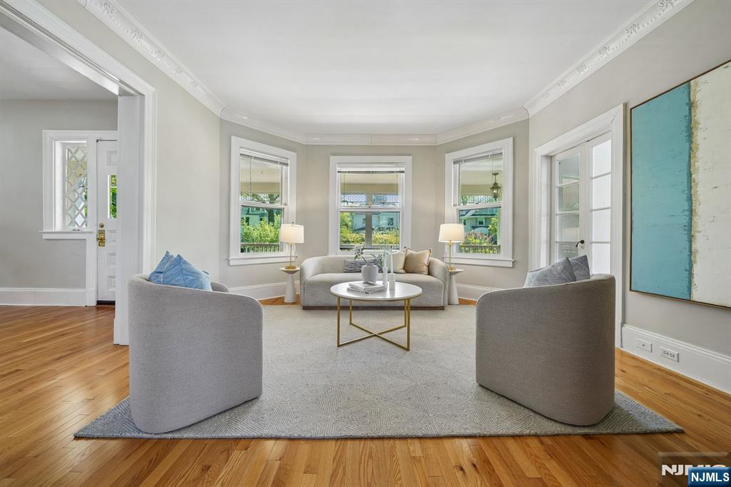 215 Inwood Avenue Montclair, NJ 07043 - Photo 9 of 50 a living room with couches and a couch with wooden floor