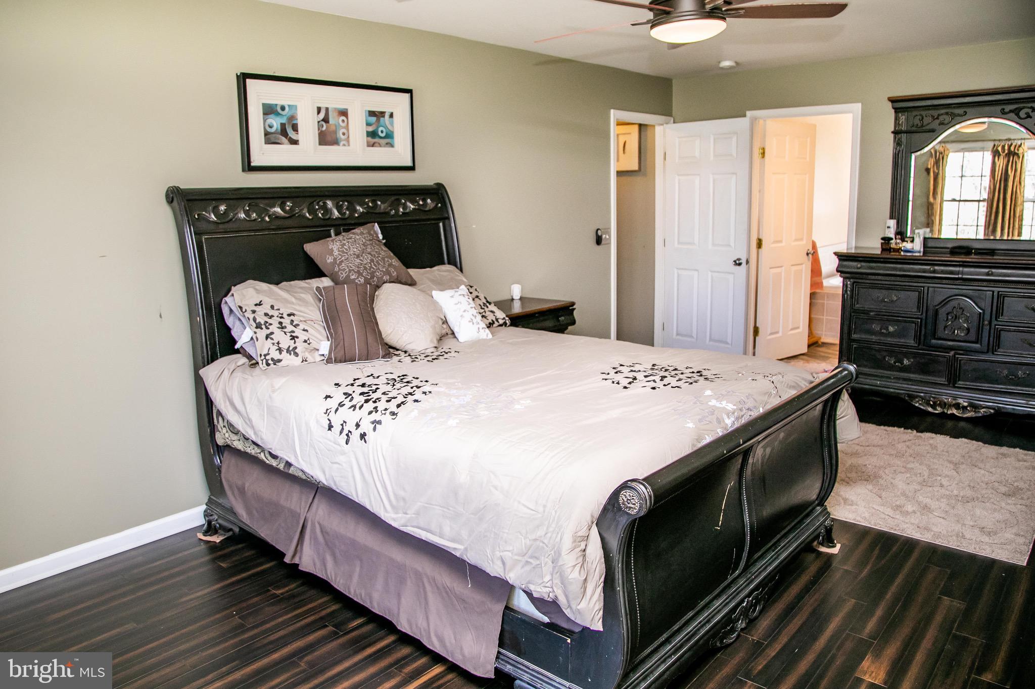 4299 Allen Road Eden, MD 21822 - Photo 27 of 54 a bed sitting in a spacious bedroom next to a window
