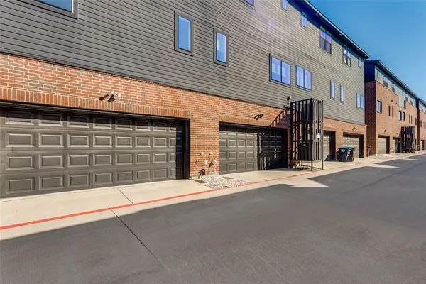 a front view of a building with a garage