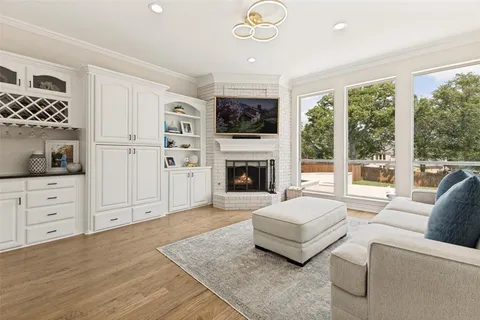 a spacious bedroom with a bed and large window