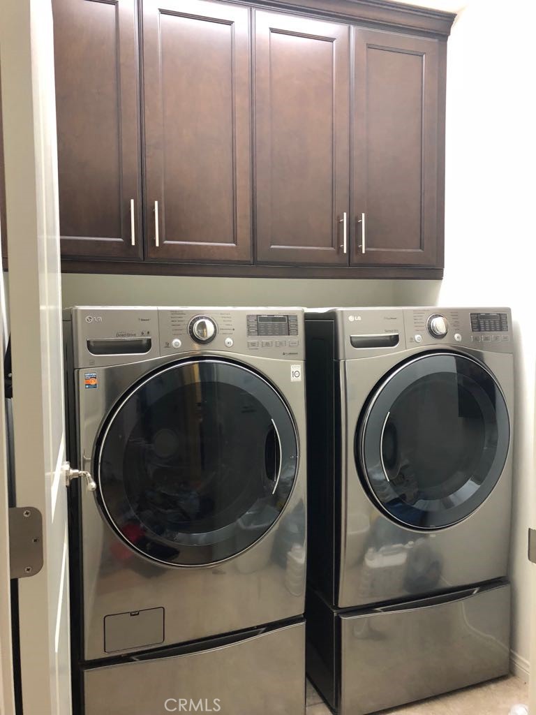 88 Lupari Irvine, CA 92618 - Photo 17 of 33 a utility room with dryer and washer