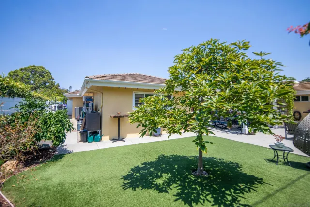 a view of a swimming pool with sitting area
