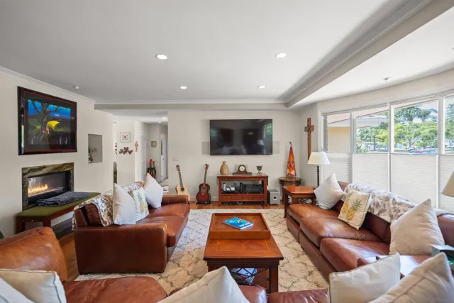 a living room with furniture and a table