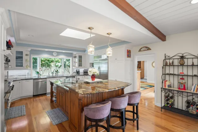 a living room with furniture flat screen tv and a fireplace