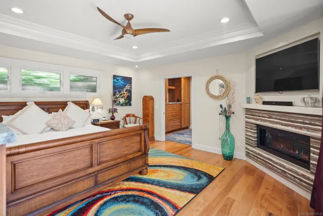 a kitchen with granite countertop a sink and a wooden cabinets