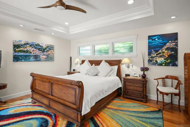 a bathroom with a toilet a sink and a mirror