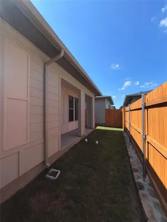 a view of kitchen and kitchen with furniture wooden floor and window