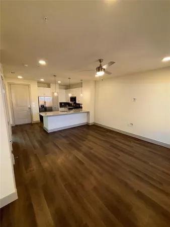 a view of kitchen with wooden floor