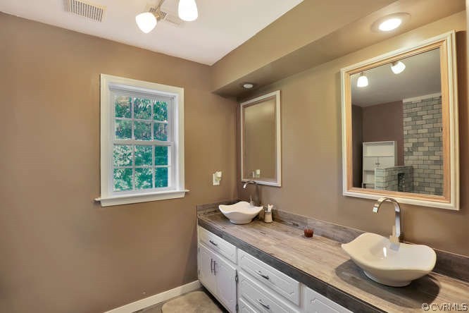 1554 Walkers Ridge Road Powhatan, VA 23139 - Photo 18 of 24 Gorgeous renovated master bathroom with double sin