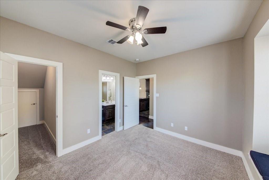 12212 Tawny Farms Road, Unit 142 Austin, TX 78748 - Photo 15 of 38 an empty room with closet and a ceiling fan