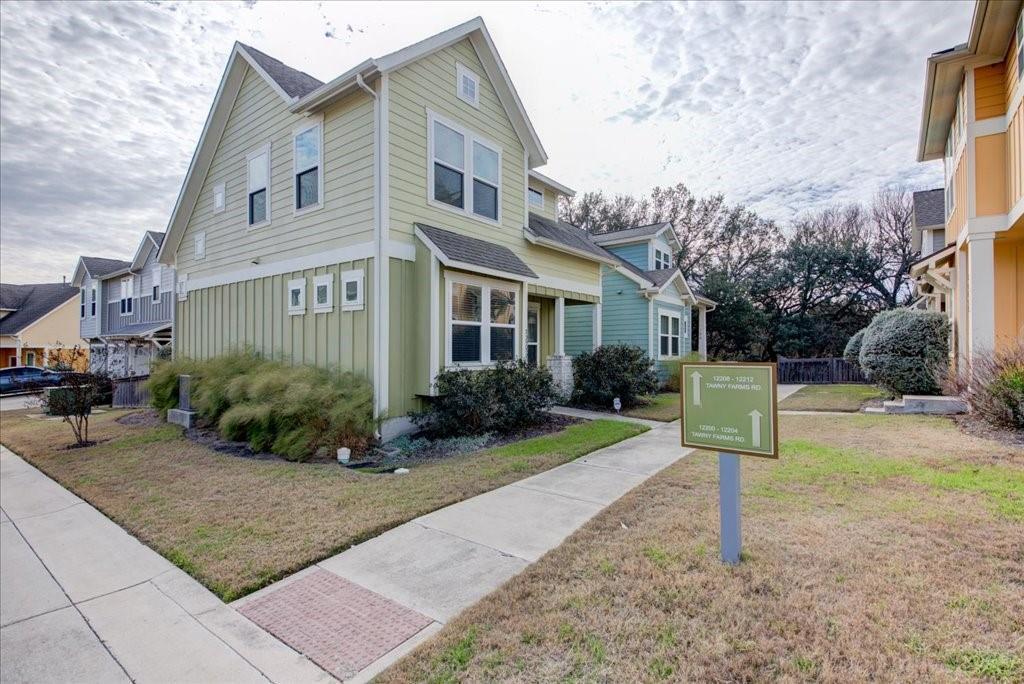 12212 Tawny Farms Road, Unit 142 Austin, TX 78748 - Photo 2 of 38 a view of a yard in front of house