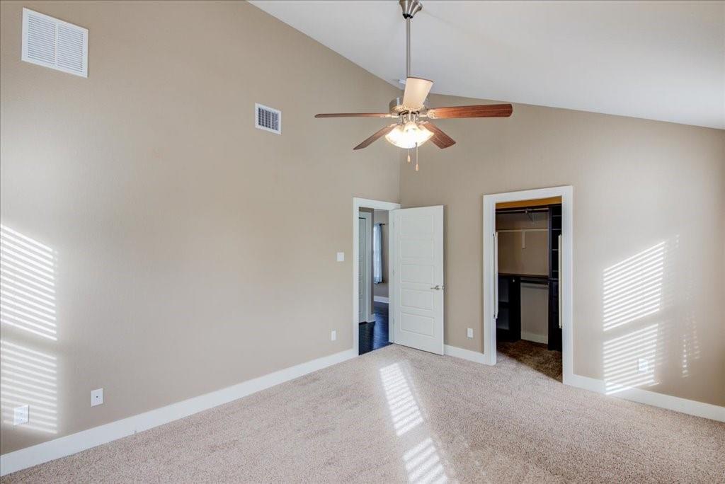 12212 Tawny Farms Road, Unit 142 Austin, TX 78748 - Photo 23 of 38 a view of a chandelier fan and a livingroom with a chandelier fan