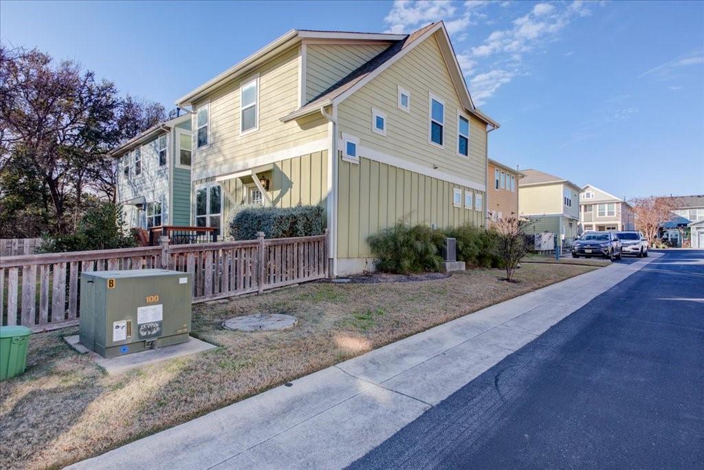12212 Tawny Farms Road, Unit 142 Austin, TX 78748 - Photo 30 of 38 a view of a street with a house in the background