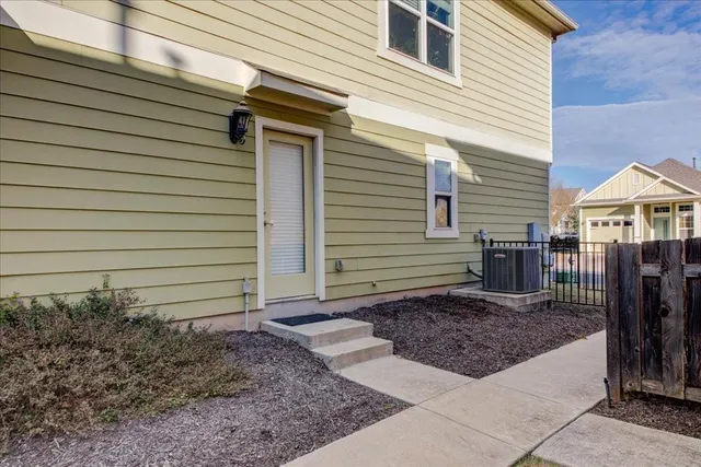 a view of a house with a yard and garage