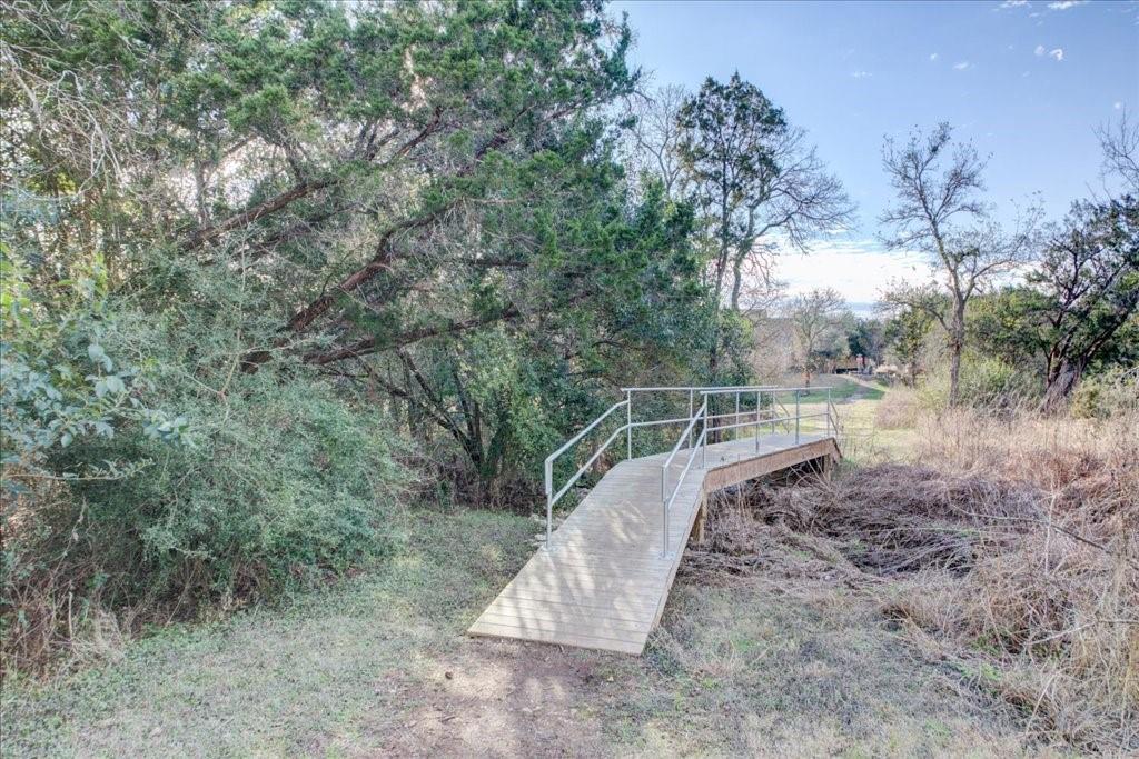 12212 Tawny Farms Road, Unit 142 Austin, TX 78748 - Photo 32 of 38 a view of a yard with large trees
