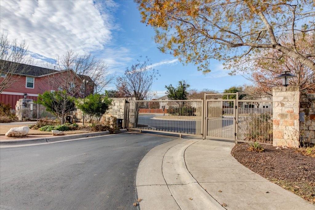 12212 Tawny Farms Road, Unit 142 Austin, TX 78748 - Photo 37 of 38 a view of a street with houses on both side