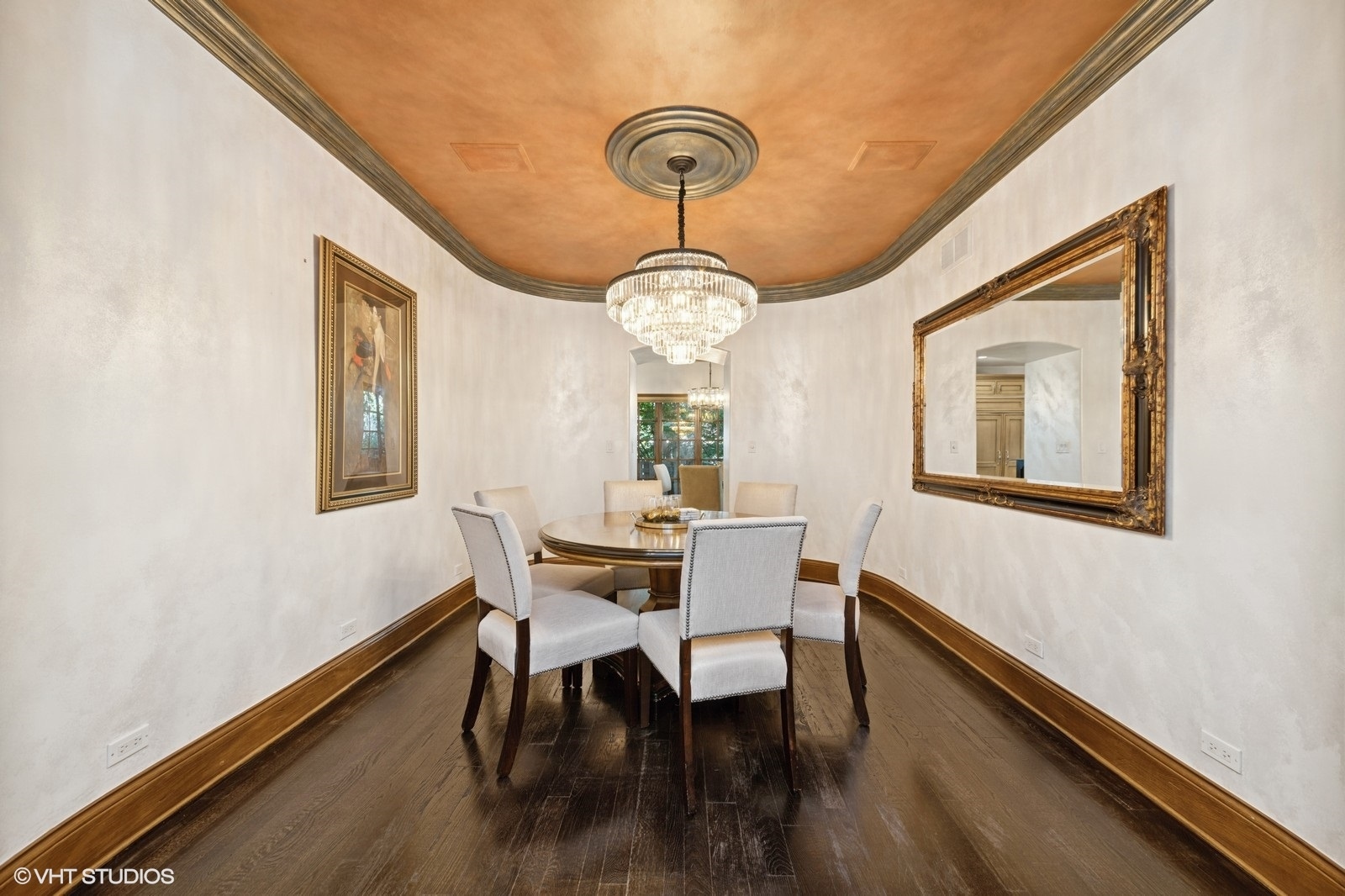 580 Oak Street Glen Ellyn, IL 60137 - Photo 30 of 93 a dining room with wooden floor a chandelier a wooden table and chairs