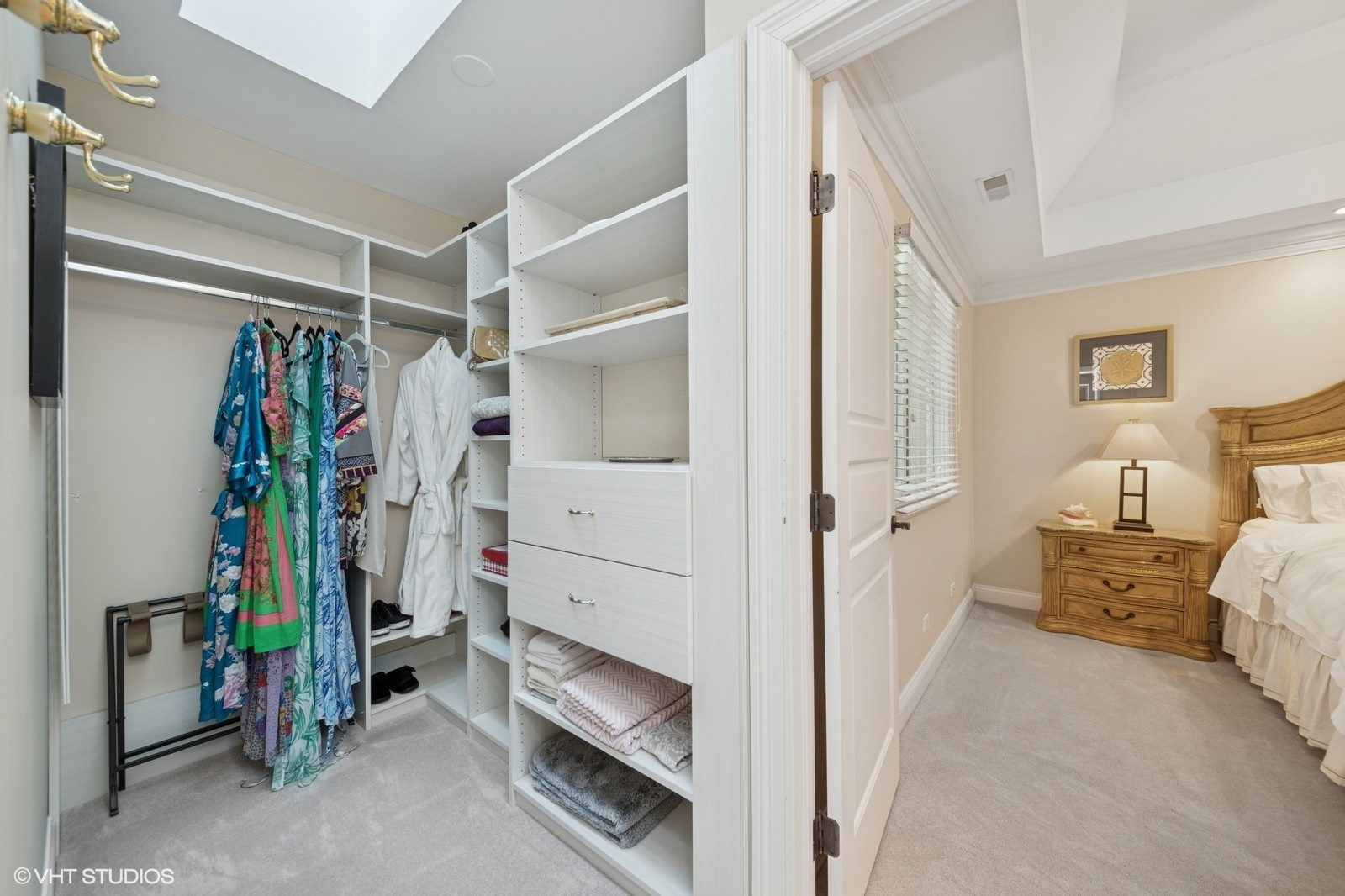 580 Oak Street Glen Ellyn, IL 60137 - Photo 47 of 93 a view of walk in closet with clothes and shoes