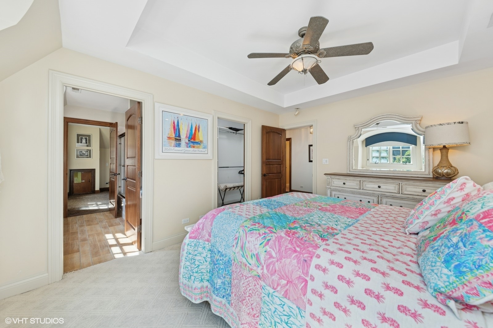 580 Oak Street Glen Ellyn, IL 60137 - Photo 50 of 93 a bedroom with a bed and a chandelier
