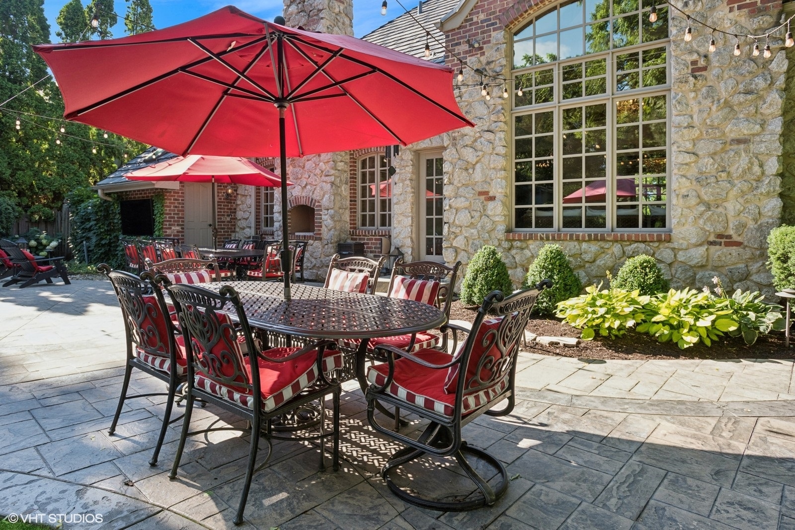 580 Oak Street Glen Ellyn, IL 60137 - Photo 76 of 93 a view of a chairs and table under an umbrella