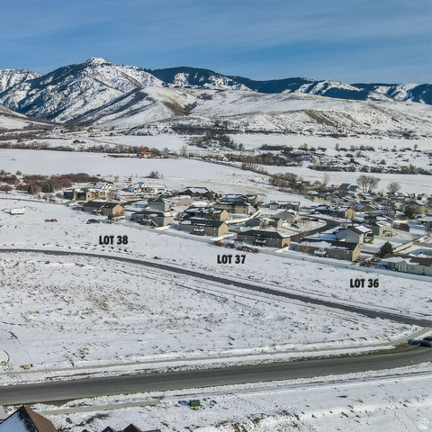 636 Cherry Ridge Lane, Unit 36 Richmond, UT 84333 - Photo 4 of 6 View of mountain background featuring nearby suburban area