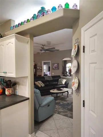 a room with furniture and a large window