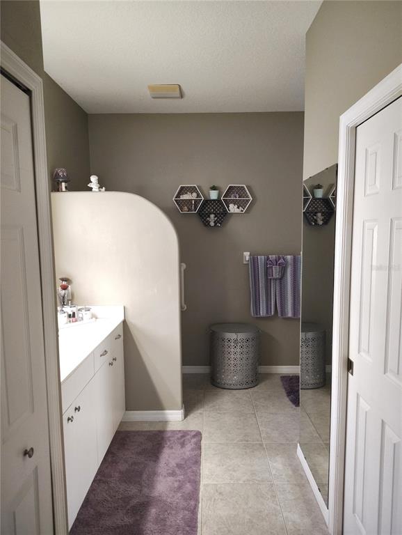 3315 Elm Street Ellenton, FL 34222 - Photo 15 of 51 a bathroom with a bathtub sink and toilet