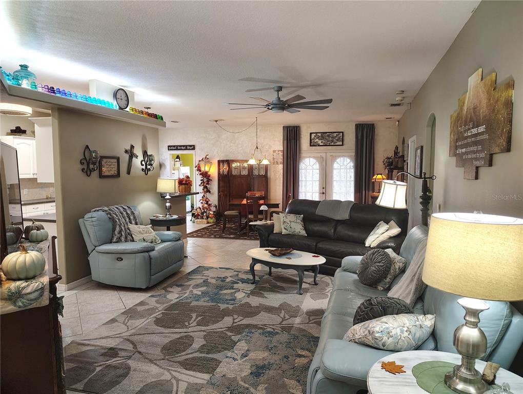 3315 Elm Street Ellenton, FL 34222 - Photo 5 of 51 a living room with furniture and a flat screen tv