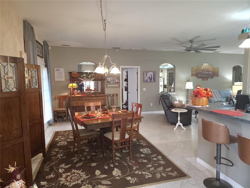 3315 Elm Street Ellenton, FL 34222 - Photo 7 of 51 a view of a dining room with furniture