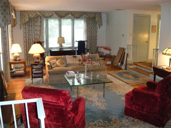 117 Radcliffe Road Belmont, MA 02478 - Photo 3 of 6 a living room with furniture fireplace and large windows