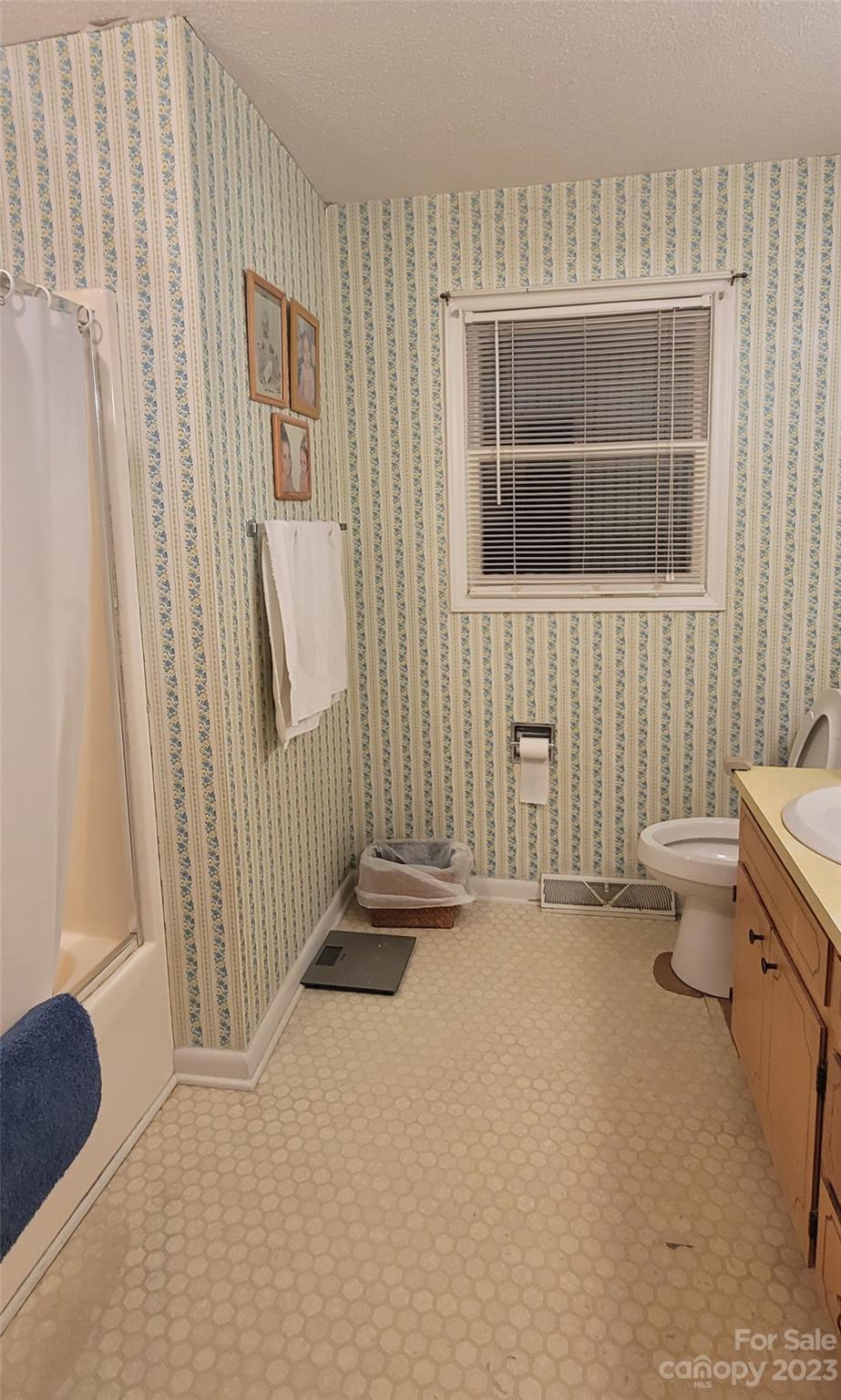 1366 Ridge Avenue Mount Pleasant, NC 28124 - Photo 14 of 28 a view of a room with a window and wooden floor