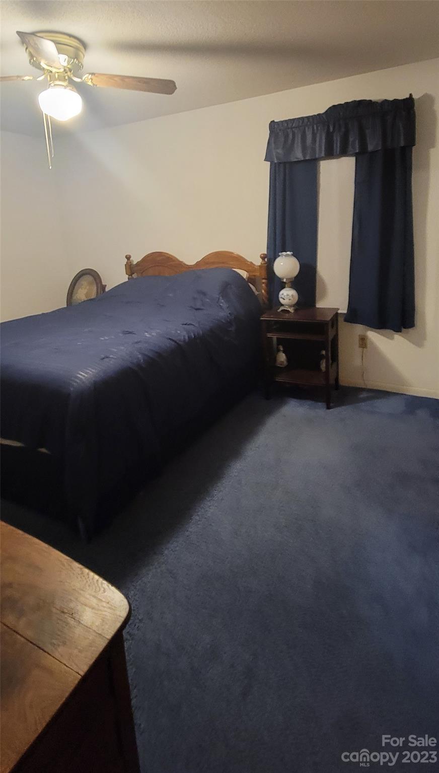 1366 Ridge Avenue Mount Pleasant, NC 28124 - Photo 23 of 28 a bedroom with a bed and a window