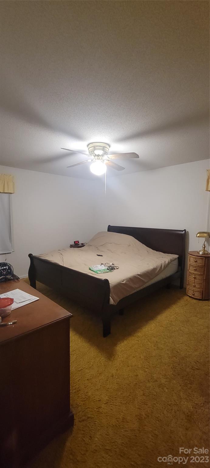 1366 Ridge Avenue Mount Pleasant, NC 28124 - Photo 28 of 28 a bathroom with a sink and a stove